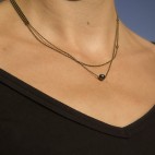 Collier asymétrique avec doubles chaîne bronze et hématites