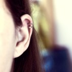 Pure titanium ear cuff with silver faceted bead
