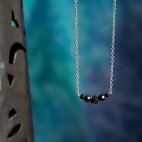 Minimalist necklace with stainless steel chain and black gemstone beads