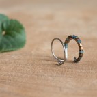 Pure titanium ear cuff with tiny green and copper hematite beads - Spark