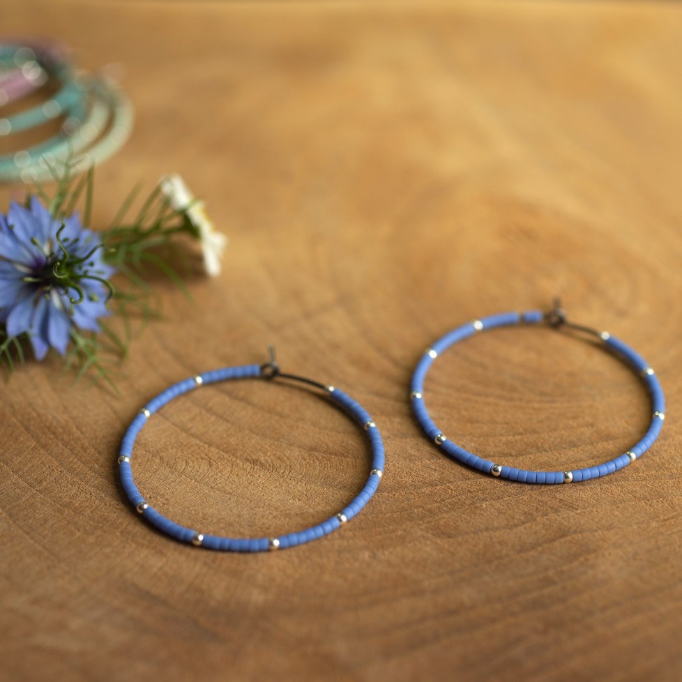 Pure titanium hoop earrings with periwinkle glass beads and silver beads