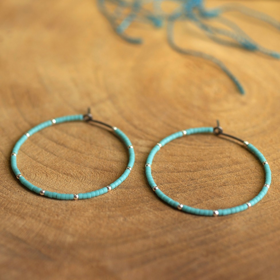 Pure titanium hoop earrings with turquoise glass beads and silver beads