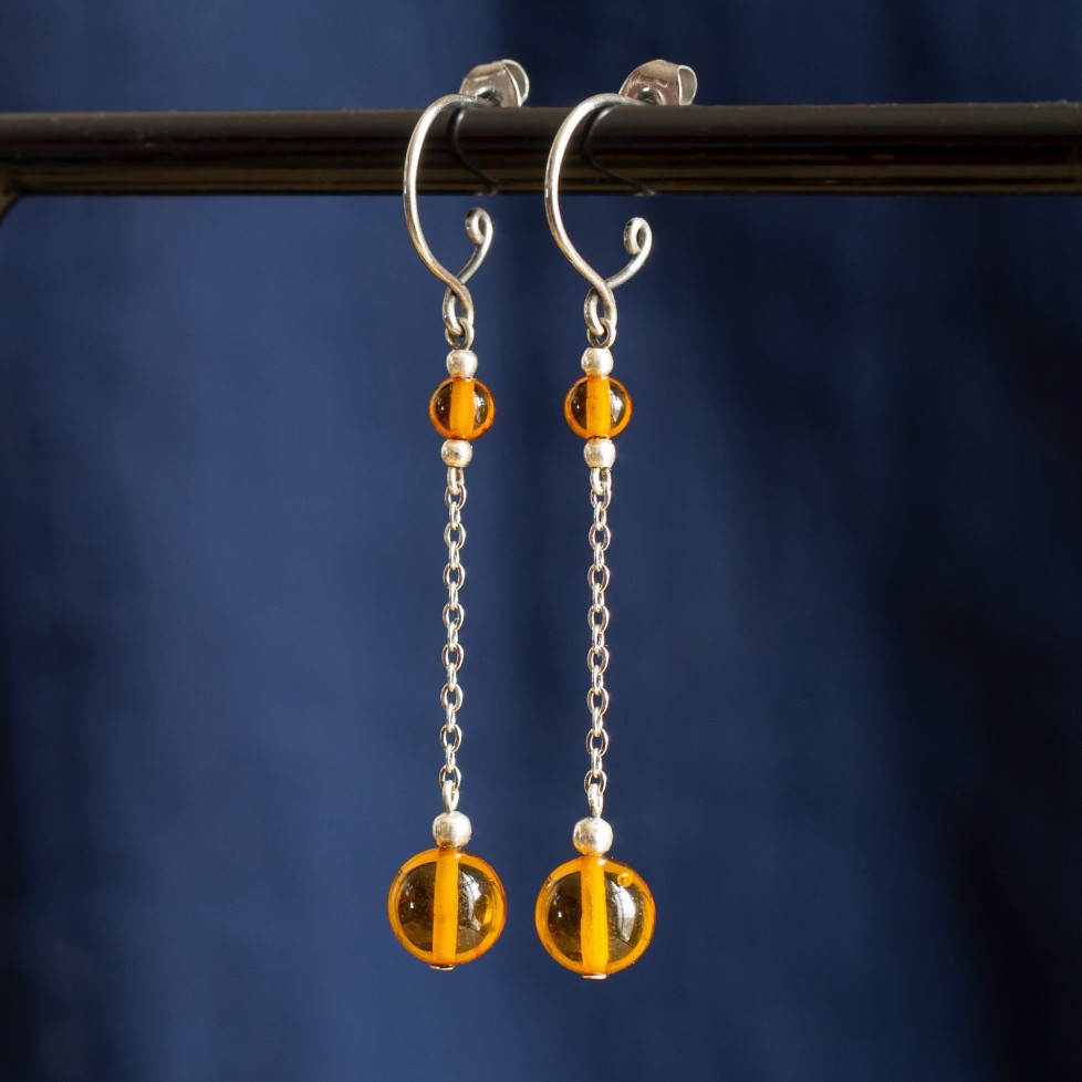 Titanium drop earrings with Baltic Amber beads